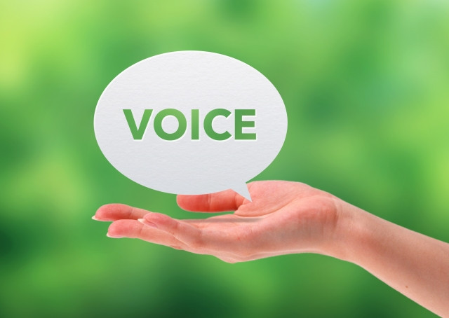 手の上に浮かぶVOICEの吹き出し